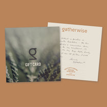 A Gatherwise gift card displayed on a warm brown background.