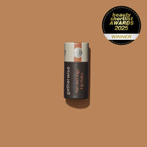 A single Gatherwise Sun and Sage Lip Balm tube centered on a warm tan background, with a Beauty Shortlist Awards 2025 badge is displayed in the upper right corner.